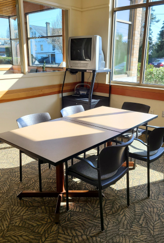 Windowed room with table and chairs